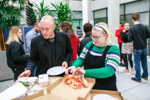 Volunteers at the mapathon having some pizza