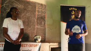 Two Golden Boots reps speaking in classroom